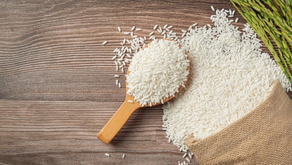 sack-rice-with-rice-wooden-spoon-rice-plant-2048x1365-1